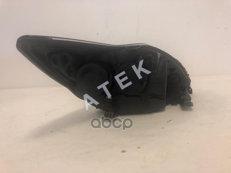 ATEK FOCUS 09 Фара левая, хром (с эл. коррект, 7pin) RP-13553