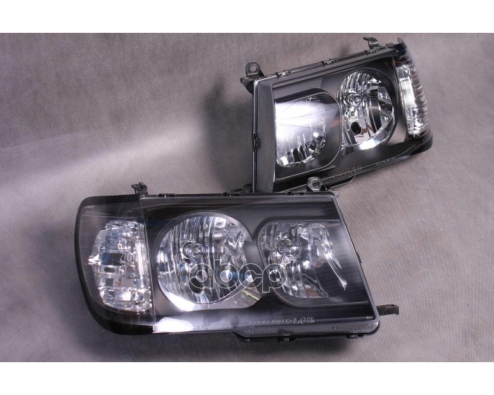 Фара Toyota Land Cruiser (J100) 98-05 (Галоген/ Комплект/ Ручная регулировка/ чёрные) Depo арт. D12-1103P-LD-E2