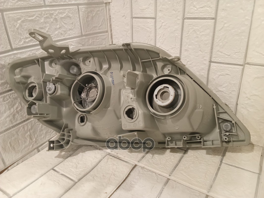 Фара L TOYOTA Corolla 04-06